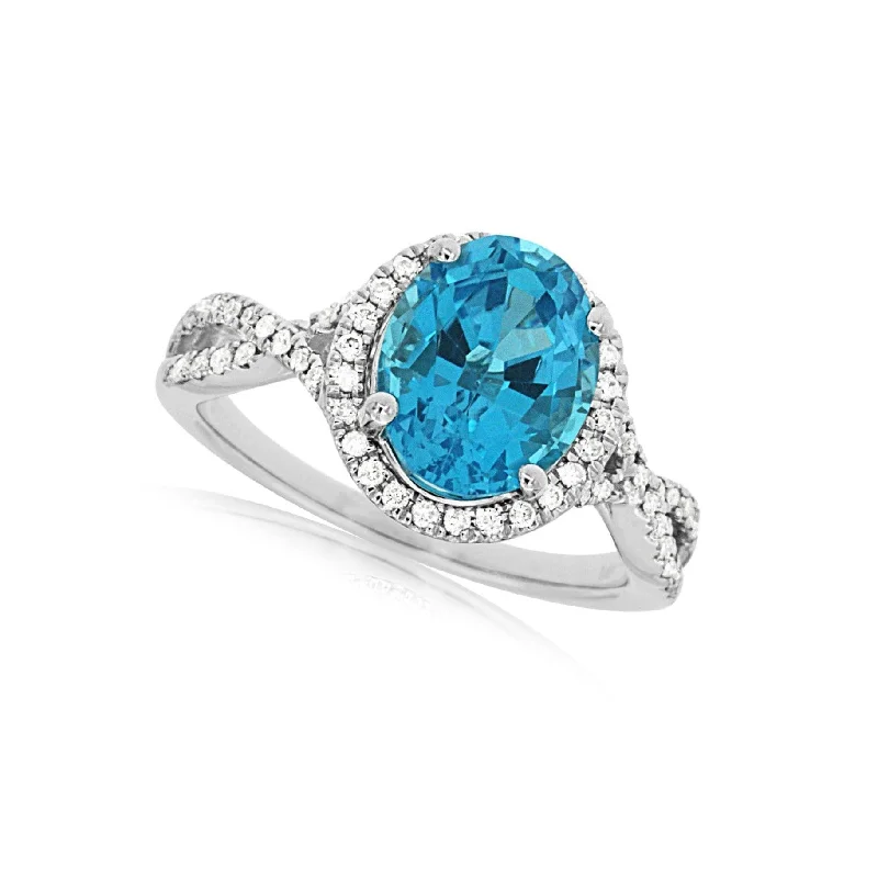 Breathtaking Jewelry At Limited-Time Savings Oval Blue Topaz and Diamond Halo Ring