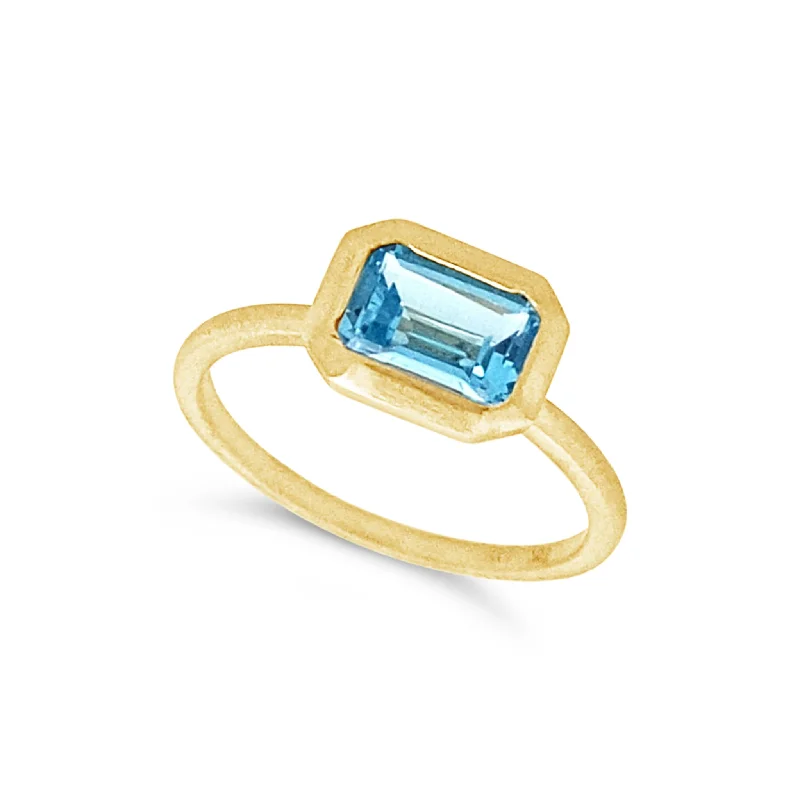 Chic, Trendy, And Affordable Jewelry Sale Bezel Set Emerald Cut Blue Topaz Ring