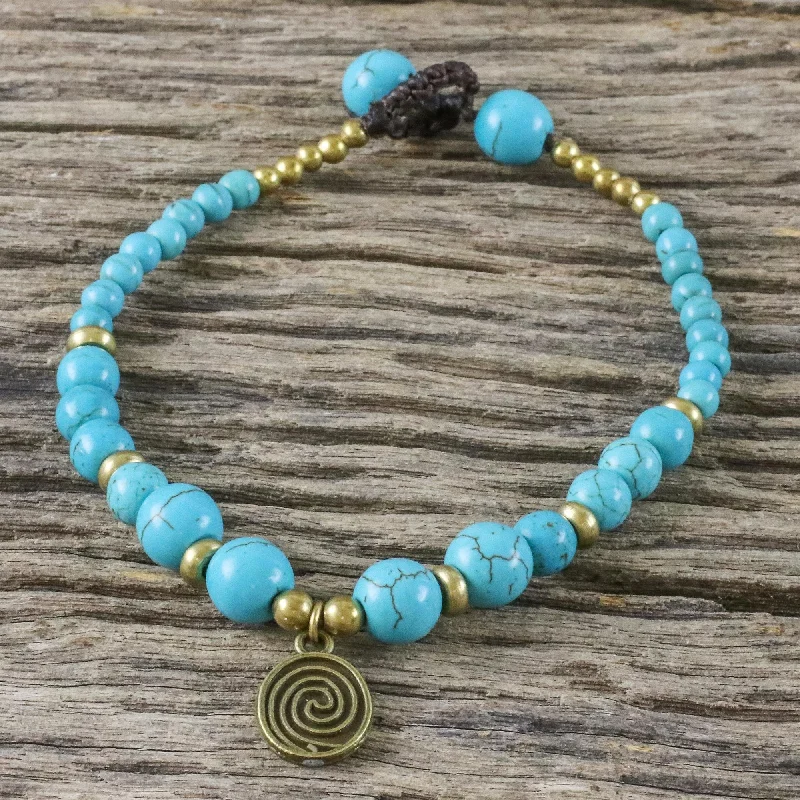 The Perfect Jewelry Piece At The Perfect Price Andaman Waves Turquoise Colored Bead Bracelet with Brass Charm The Perfect Jewelry Piece At The Perfect Price Andaman Waves Turquoise Colored Bead Bracelet with Brass Charm