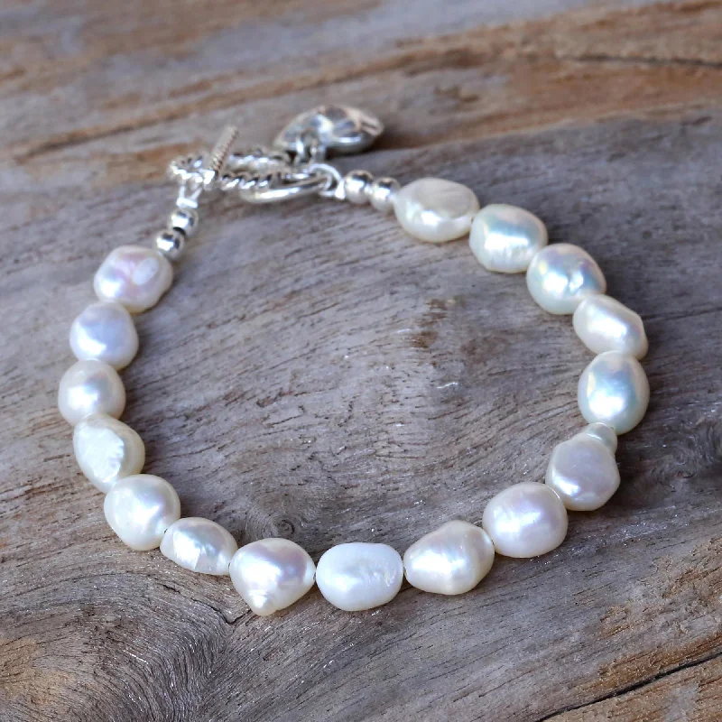 Make Your Outfit Shine With Discounted Jewelry Promising Love Cultured Pearl Beaded Heart Charm Bracelet from Thailand Make Your Outfit Shine With Discounted Jewelry Promising Love Cultured Pearl Beaded Heart Charm Bracelet from Thailand