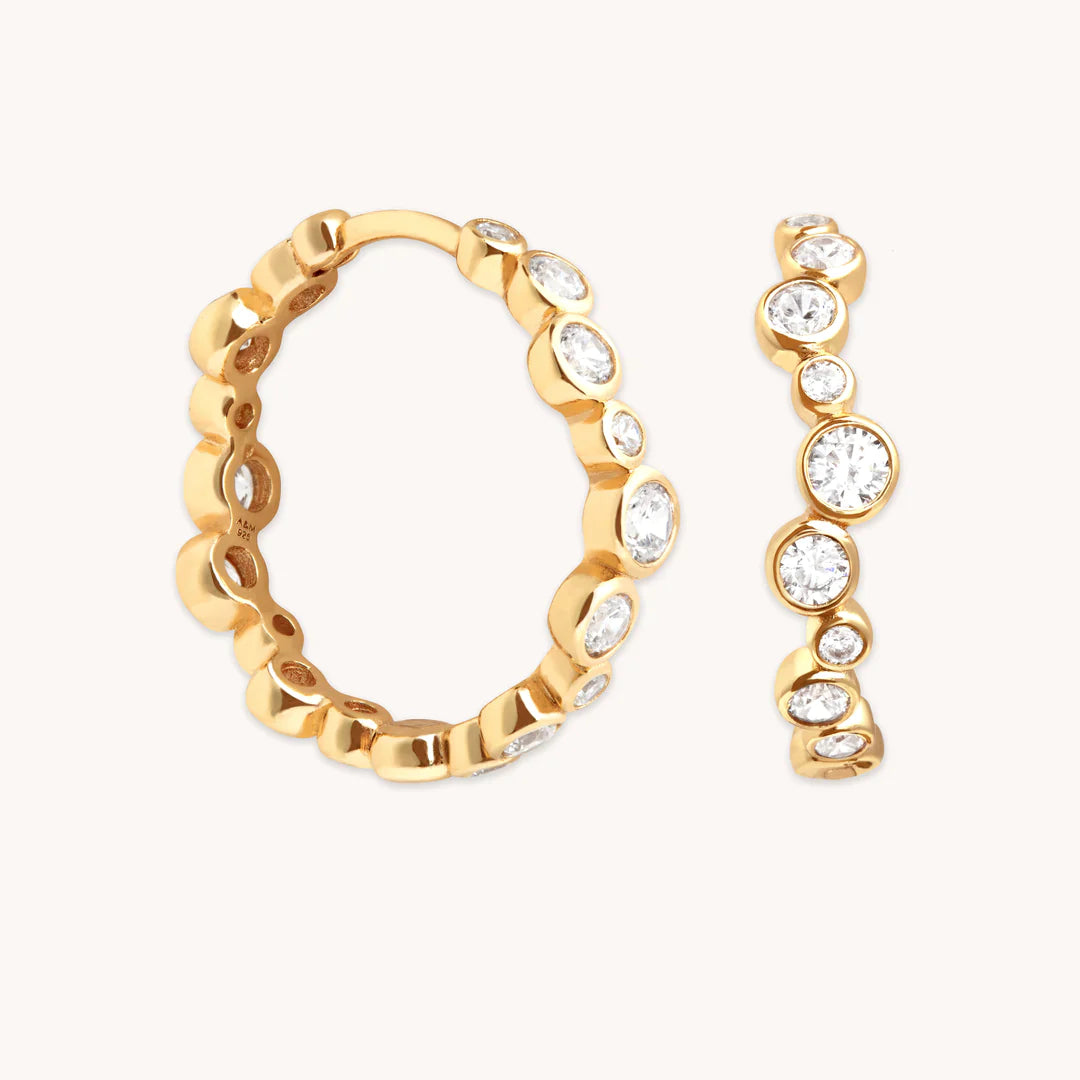 Bestselling Jewelry At Special Promotional Rates Gleam Crystal Hoops in Gold