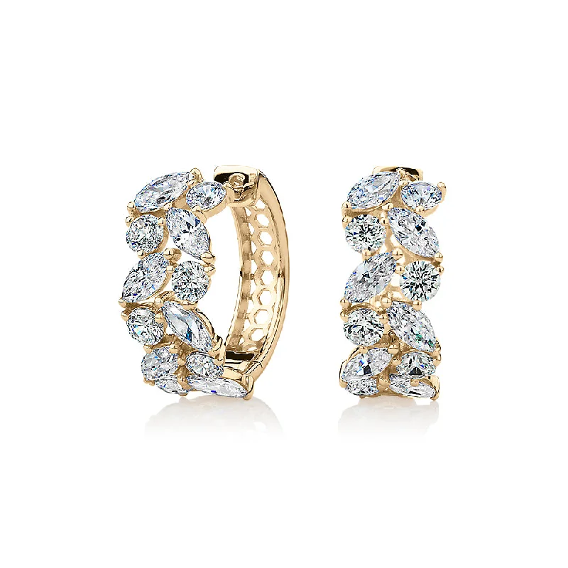 Buy More, Save More On Stunning Jewelry Pieces Marquise and Round Brilliant hoop earrings with 2.88 carats* of diamond simulants in 10 carat yellow gold Buy More, Save More On Stunning Jewelry Pieces Marquise and Round Brilliant hoop earrings with 2.88 carats* of diamond simulants in 10 carat yellow gold