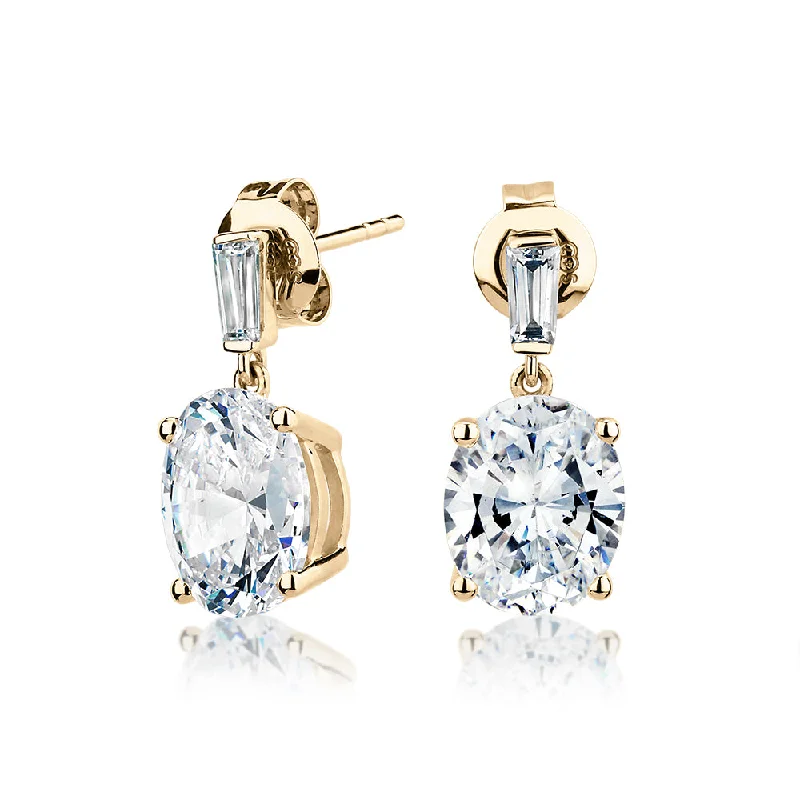 Limited-Time Jewelry Sale – Elegant Styles At Less Oval and Baguette drop earrings with 5.50 carats* of diamond simulants in 10 carat yellow gold Limited-Time Jewelry Sale – Elegant Styles At Less Oval and Baguette drop earrings with 5.50 carats* of diamond simulants in 10 carat yellow gold