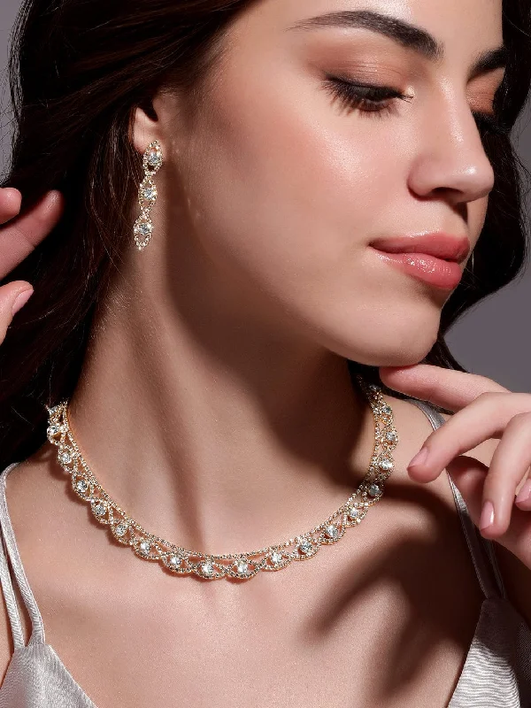 Shop Dazzling Jewelry At The Best Prices Rubans 18K Gold Plated AD & White Cubic Zirconia Studded Necklace and Earring Set Shop Dazzling Jewelry At The Best Prices Rubans 18K Gold Plated AD & White Cubic Zirconia Studded Necklace and Earring Set