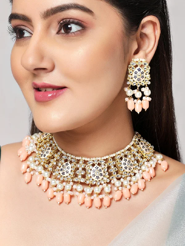 Shop Dazzling Jewelry At The Best Prices Rubans Women Gold-Plated Peach-Colored Kundan & Beaded Jewellery Set Shop Dazzling Jewelry At The Best Prices Rubans Women Gold-Plated Peach-Colored Kundan & Beaded Jewellery Set